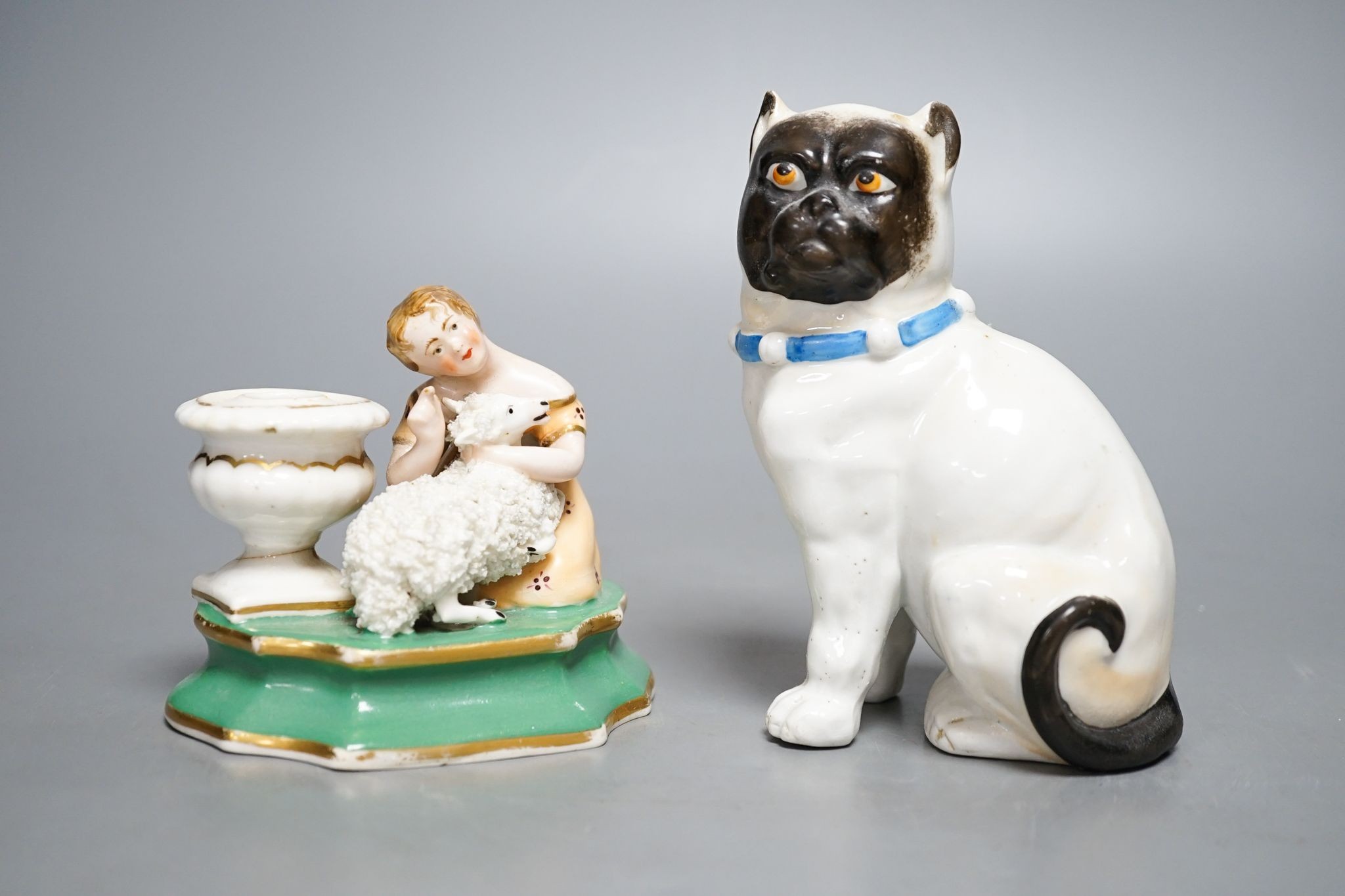 An English porcelain girl with sheep inkwell, c.1835 and a Continental porcelain pug dog, 14cm